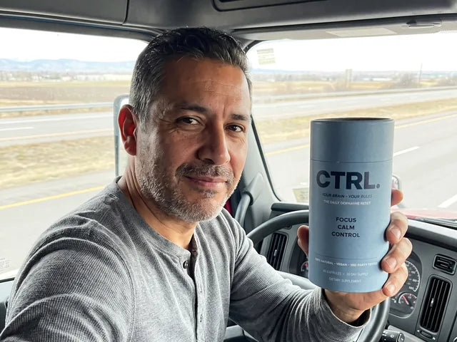 Carlos G., a verified CTRL customer, holding his CTRL tube