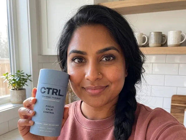 Rachel A., a verified CTRL customer, holding her CTRL tube