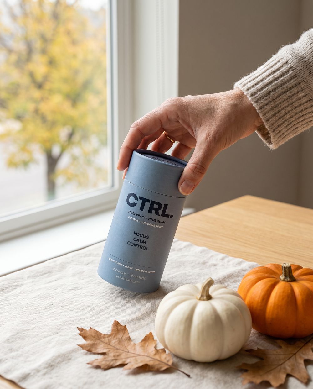CTRL held in a hand
