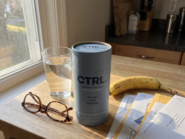 Susan R., a CTRL customer in her fifties, holding her CTRL tube
