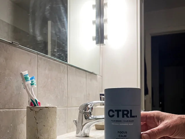 Margaret L., a CTRL customer in her fifties, holding her CTRL tube